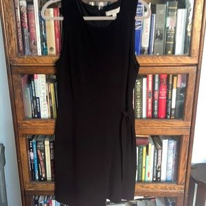 Sleeveless black wrap waist dress,
